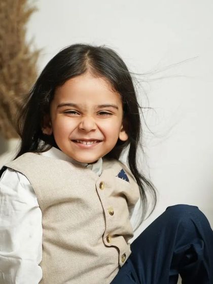 A big, happy grin from this handsome little man during his pre-mundan photoshoot.