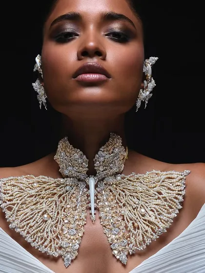 A close-up on an exquisite butterfly necklace for Bina Goenka. For luxury jewellery photography, my focus is on capturing the intricate craftsmanship and the way light interacts with every facet, making the piece feel alive.