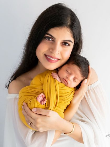 A mother holding her newborn. The bond between a mother and her child is one of the most powerful things in the world, and I am honored to capture it.