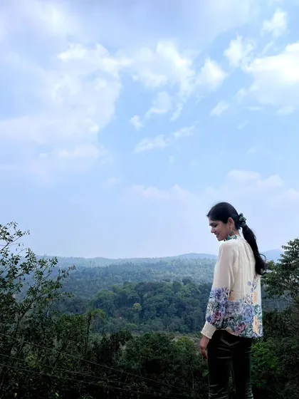 Looking out over a vast expanse of forest and hills. The sheer scale of nature is humbling and provides a powerful perspective.