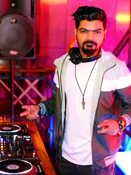 The vibe at The Fixx Bar is always electric. Here I am at the console, ready to drop some Bollywood and Moombahton bangers.