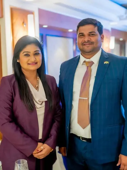 With a delegate from the Brazilian government. I enjoy connecting with people from different cultures.