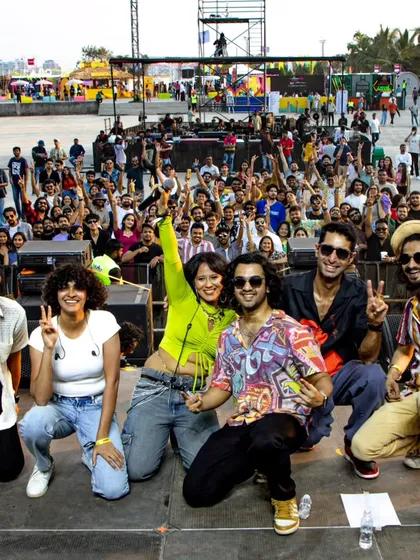 All smiles and good vibes on and off the stage at VH1 Supersonic. I believe in creating a full party atmosphere, ensuring the audience has an unforgettable time.