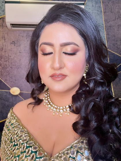 A close-up of the eye makeup for this cocktail look. The soft brown and gold tones are blended to perfection for a sultry effect.