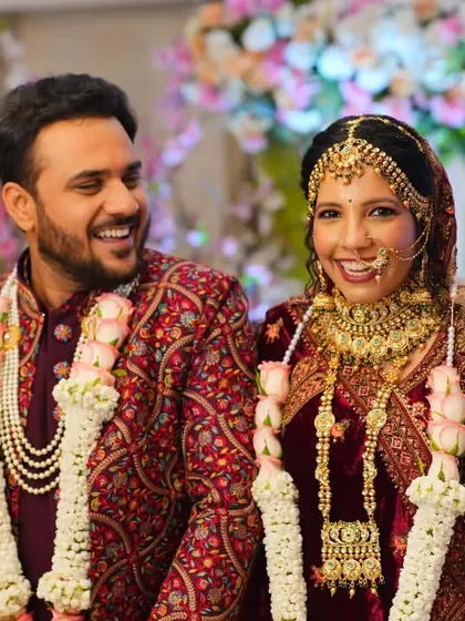 A moment of pure, uninhibited laughter between the bride and groom during their wedding ceremony.