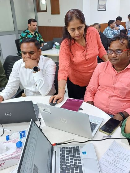 Focused Learning for Enhanced Data Skills. A participant deeply focused during our Excel workshop. We create an environment where professionals can concentrate on acquiring practical skills that will make them more efficient and valuable to their organization.
