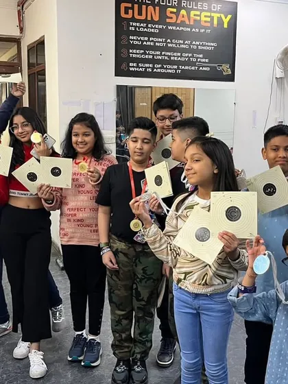 The smiles say it all. I love hosting events for kids, like this Children's Day celebration. Seeing them proudly show off their targets and medals after a safe and supervised shooting session is the best part of my job. It's a great option for a unique birthday party.