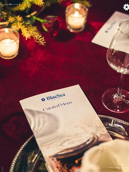 A close up of a curated menu for an event at Araya Bagh. Our partnership ensures that the culinary experience matches the grandeur of this beautiful Delhi venue.