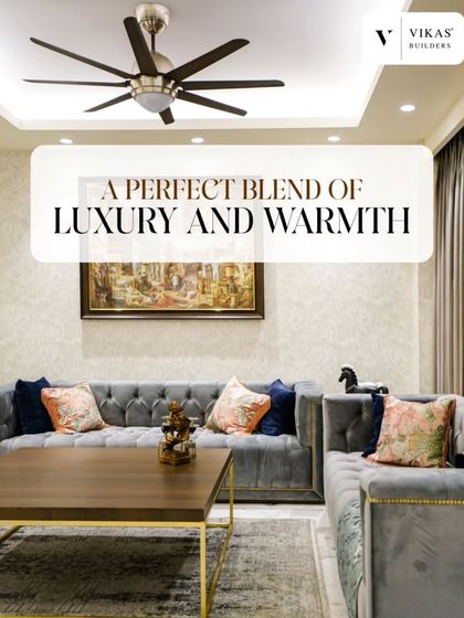 Here, we achieved a perfect blend of luxury and warmth. The plush, tufted grey sofa is paired with a simple wooden coffee table and gold accents, creating a space that is both elegant and inviting.