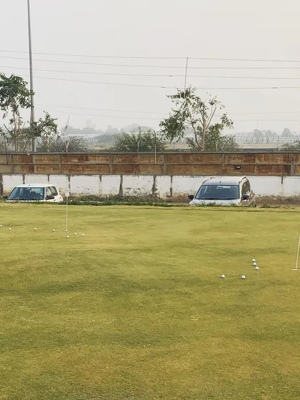 A view across our new, expansive putting green. The smooth surface and multiple holes provide an excellent practice experience.