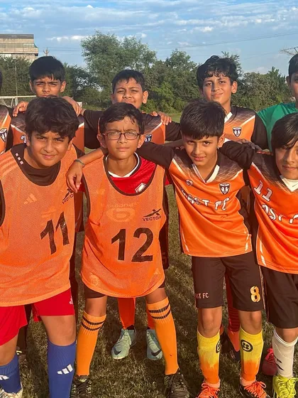 The team huddle after a friendly match, showing great team spirit.