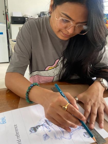 A student carefully uses a ruler and pencil to map out her drawing with the grid method. Our short term courses are perfect for adults looking to pick up a new hobby or refine their skills in a structured setting.