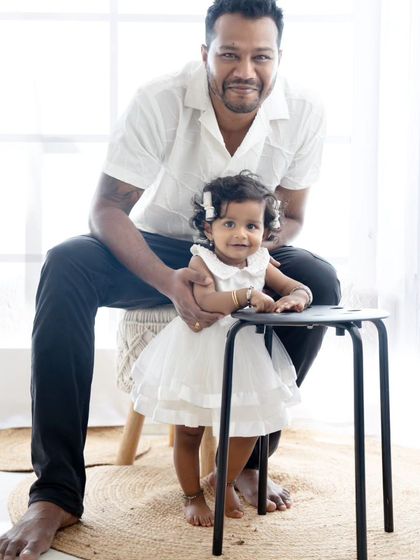 A lovely father-daughter portrait. The simple setup puts all the focus on their connection.