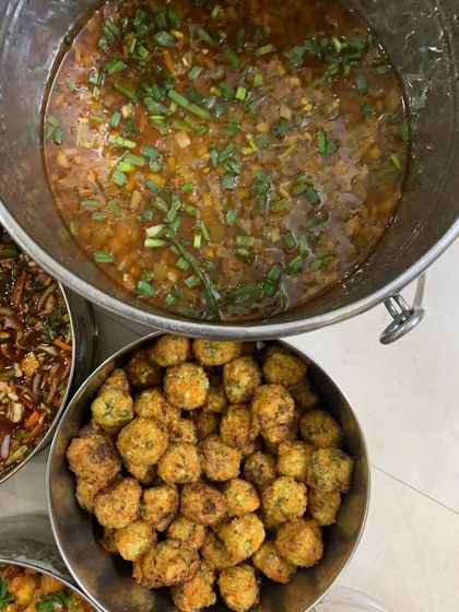Veg Manchurian balls and gravy, ready to be served.