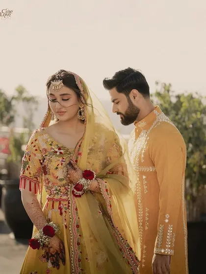 A beautiful, candid moment between the bride and groom during their Haldi ceremony. I styled them in coordinated yellow and mustard outfits that look joyful and picture-perfect.