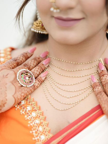 A close-up of the delicate mandala design, showing the fine lines and the beautiful ring that complements the henna.