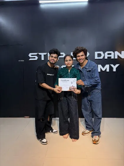 Pratibha with her certificate of completion. Ready for the next challenge.