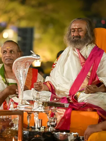We celebrate ancient traditions with reverence and joy. This is a moment from our Maha Shivratri celebration, where I am absorbed in the chants and rituals that honor the Shiva principle, the quiet, blissful consciousness within us all.