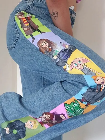 Custom painted jeans! This was a huge project, painting a whole cast of Harry Potter characters down the leg of these denims. Wearable art isn't just for shoes.