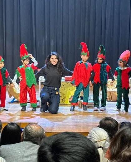 The entire cast of 'The Elves and the Shoemaker' taking a final bow with me. It's a moment of shared pride and accomplishment for everyone.