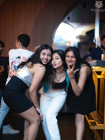 Guests striking a pose and having fun at Nasty Wednesdays.