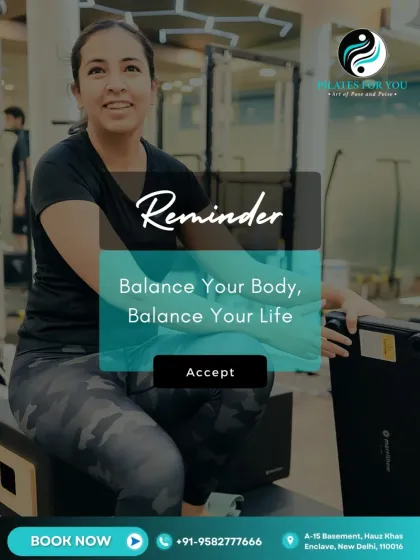 A reminder to balance your body and balance your life. This client takes a moment on the reformer box, showcasing the mental and physical poise that comes from consistent practice.