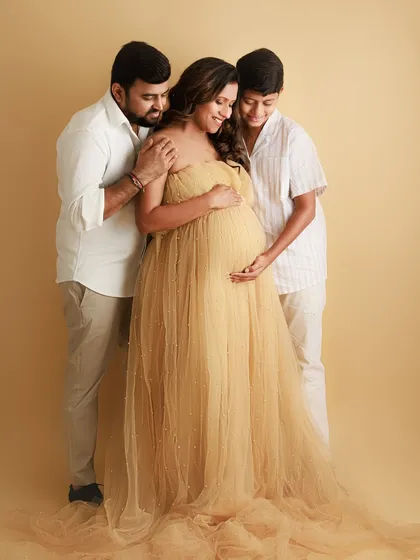 A maternity session is a celebration for the whole family. Here, big brother and dad surround mom with so much love, all of them eagerly awaiting the arrival that will make their family of three a family of four. My heart melts.