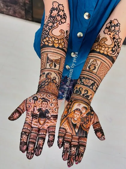An elaborate full bridal mehendi with different stories on each hand. One hand features a mother and child portrait, while the other depicts a couple, showcasing my ability to create multiple custom narratives.