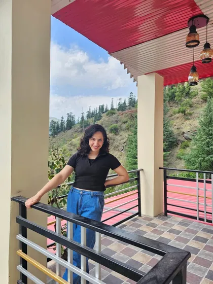 Posing on the balcony with the beautiful pine forest as a backdrop. Every corner of the farm offers a picture-perfect view and a sense of tranquility.