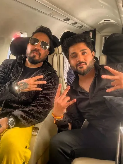 With my Ustaad ji, the one and only Mika Singh pahji. Everything I know about art, performance, and sustaining in this industry, I have learned from him. His blessings are my strength.