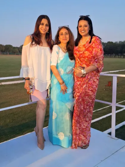 Enjoying a Sunday at the Northern Indian Polo Championship. A floral saree is a perfect choice for a daytime sporting event, offering a blend of elegance and relaxed charm.
