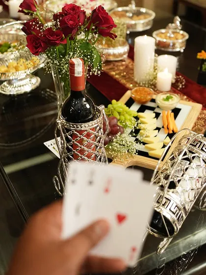 Get your A-game on for celebrations with my beautifully crafted wine holder. Paired here with a cheese board and cards, it sets the scene for a perfect evening of fun and fine wine.