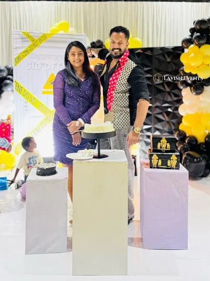 The happy couple enjoying their custom-designed "CID Officer" themed surprise party. We can tailor any theme to be fun and personal.