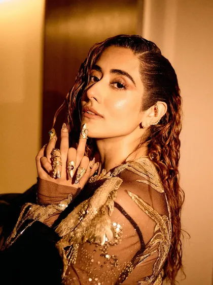 Styling Jonita Gandhi for her opening performance at the Dua Lipa concert in Mumbai was an incredible experience. We selected this exquisite Rahul Mishra Couture piece, focusing on intricate embroidery and pairing it with statement boots for a powerful stage presence.