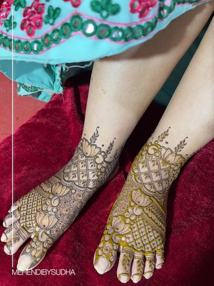 A wider angle of the bridal foot mehendi, showing how it beautifully adorns the feet.
