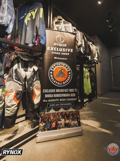 The official welcome banner for our exclusive breakfast ride, hosted at the Rynox store. Partnerships like these make our community rides even more special.