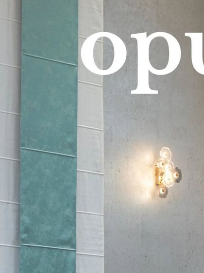 A collection of detail shots from "The White House" project, focusing on material interplay: artistic light fixtures on concrete walls, elegant mirrors, and the transition between wood and patterned flooring.