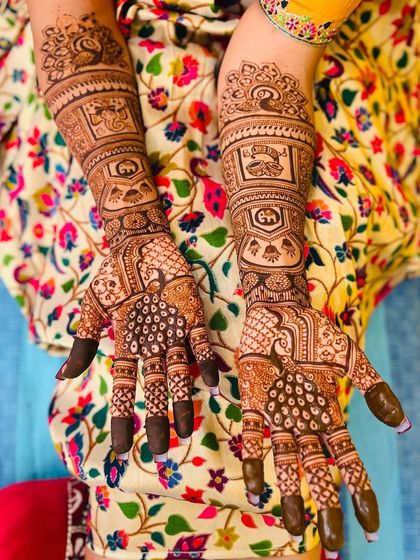 This bridal design features the couple's initials 'SN' and other personalized elements, making it unique to them.