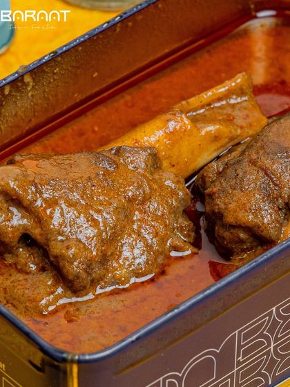 I meticulously slow-cook my Nalli Nihari, allowing the tender lamb shanks to simmer in a fragrant blend of spices for a luscious depth of flavor.