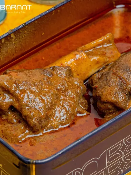 I meticulously slow-cook my Nalli Nihari, allowing the tender lamb shanks to simmer in a fragrant blend of spices for a luscious depth of flavor.