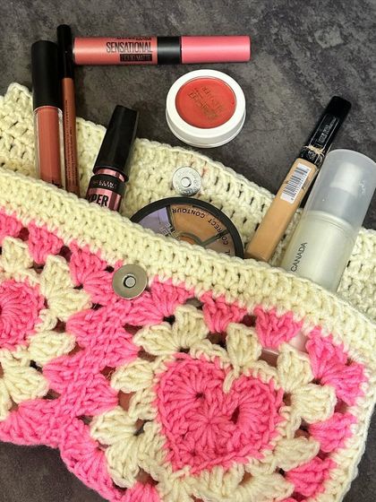 A look inside my granny square heart pouch. It's the perfect size to be used as a makeup bag, holding all the essentials while looking super cute.