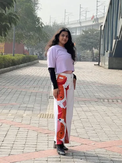 Your daily college OOTD doesn't have to be boring. I styled these unique abstract-print pants with a simple lavender crop top for a casual, artistic look that's perfect for campus life. Let's make your everyday style stand out.