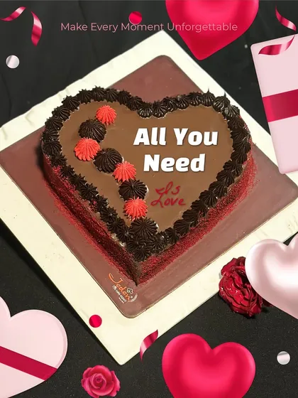 All you need is love, and maybe a heart-shaped cake. Our Valentine's special chocolate cake is decorated with red and chocolate frosting swirls, making it an unforgettable treat for your celebration.