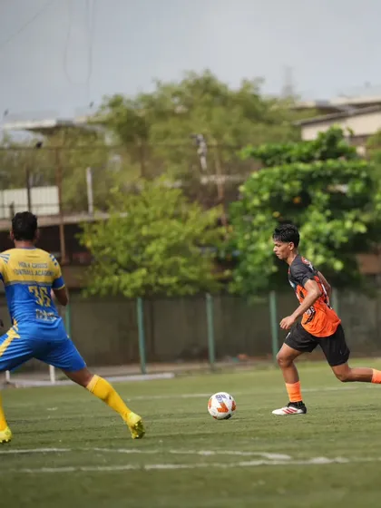 A player sprints down the wing, creating width and stretching the opposition's defense.