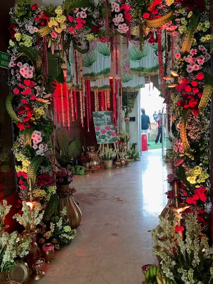 The entrance to the event, a lush floral archway that gives guests a hint of the 'Bagh-e-Ishq' that awaits them inside.