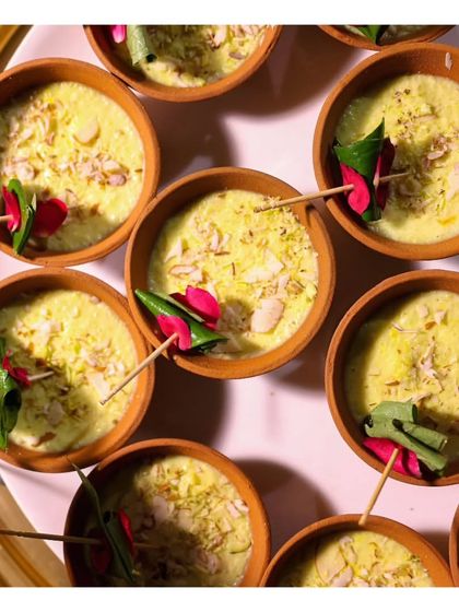 An overhead shot of our paan-flavoured phirni served in traditional clay sakoras. We love to innovate with classic Indian desserts, offering familiar flavours in a unique and refreshing format.