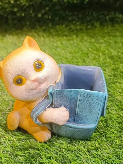 The same kitten penholder design with a blue basket.