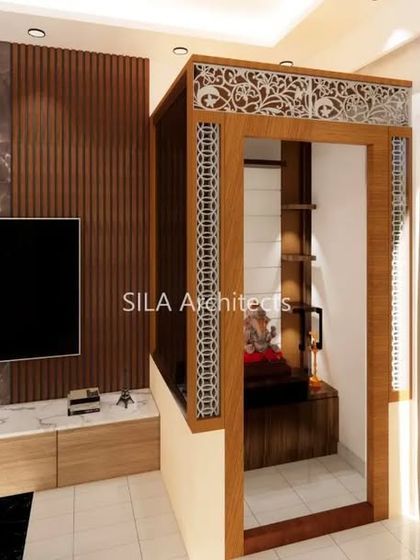 A 3D render for a new client in JP Nagar, showing a TV unit next to a beautifully detailed pooja unit, demonstrating our ability to integrate sacred spaces into living areas.