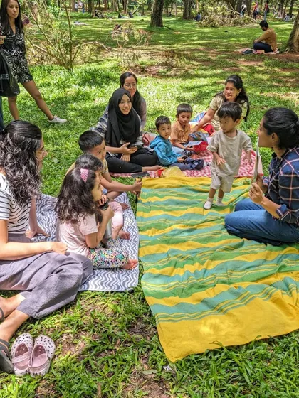 Photos from our 'Environment' week session. You can see the children learning about nature and conservation through engaging stories, right in the heart of nature itself.