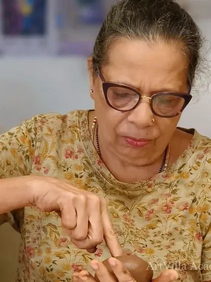 Art is for everyone, at any age. This participant is enjoying the process of shaping her clay piece during our hand-building workshop at Doolally Taproom.